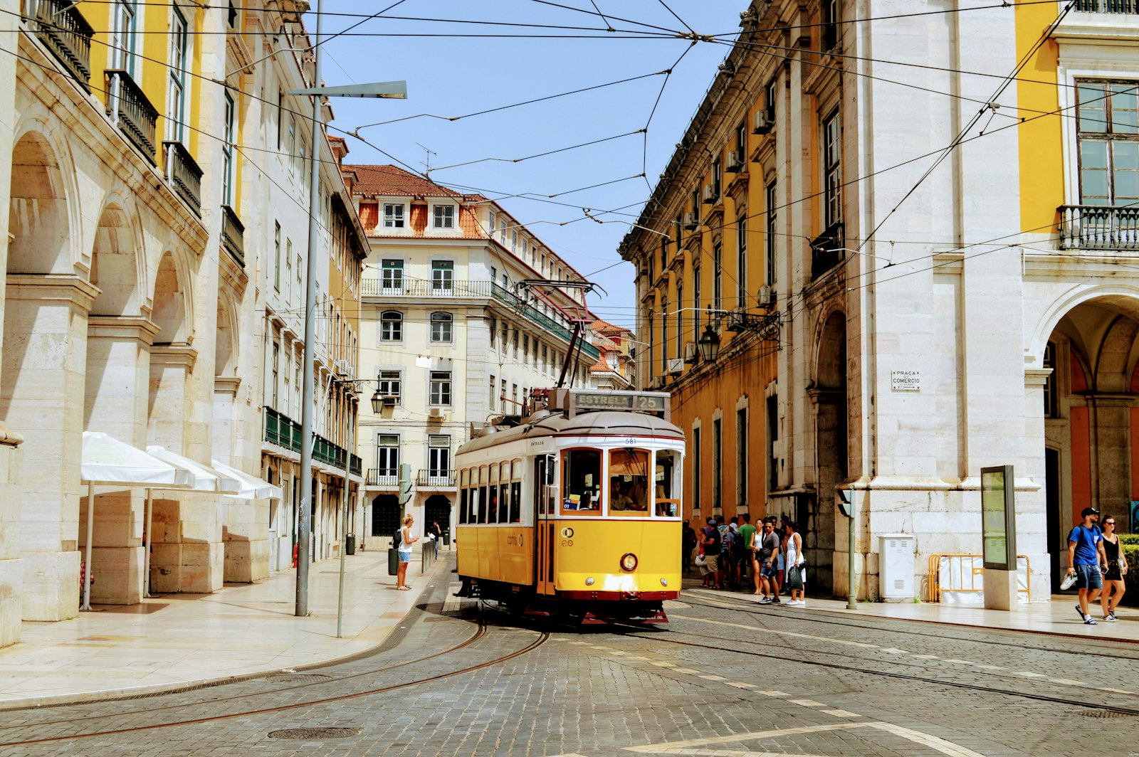 Iconic yellow tram in Lisbon's Baixa district, Portugal