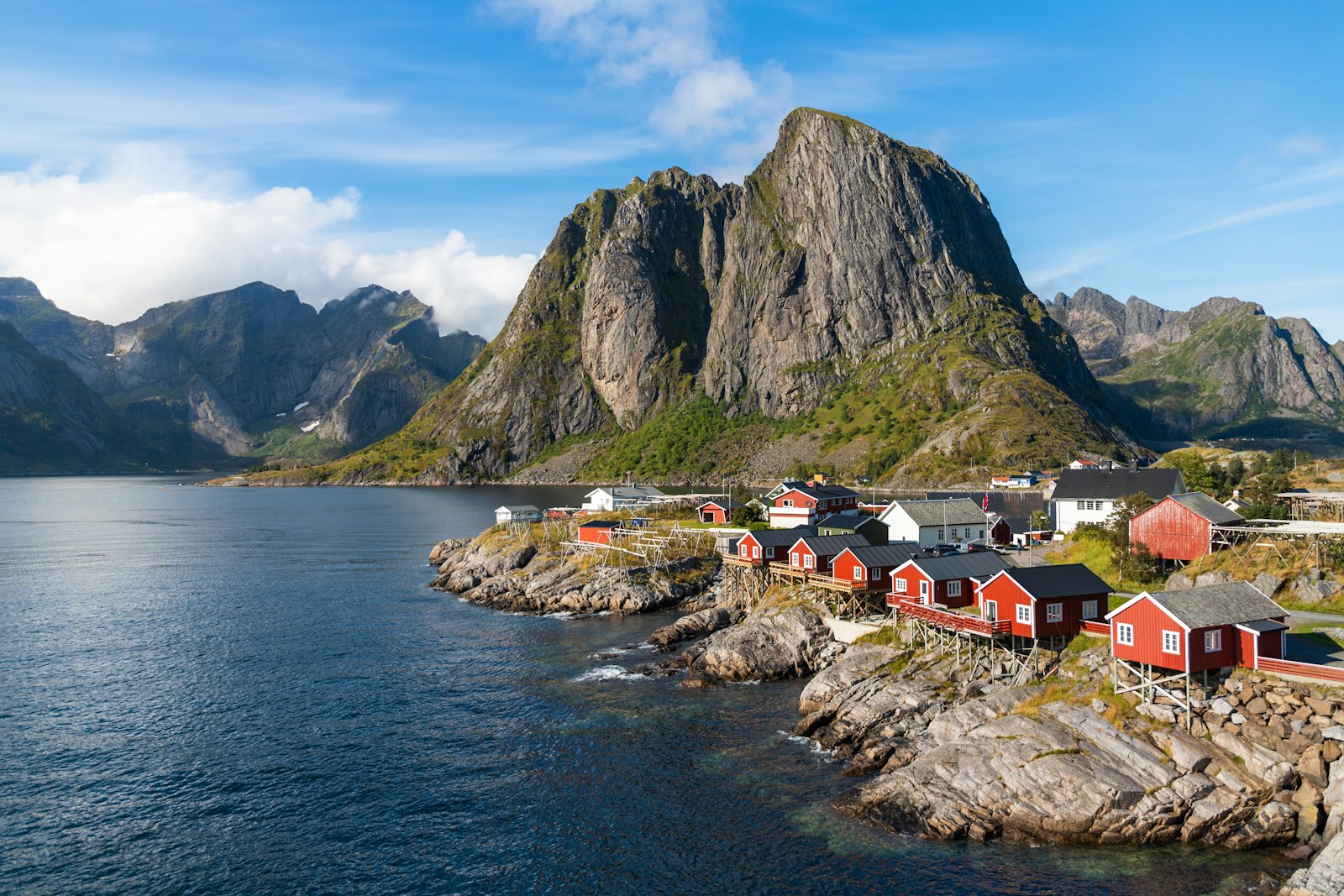 Red rorbuer fishing cabins on Reine fjord in the Lofoten Islands, Norway