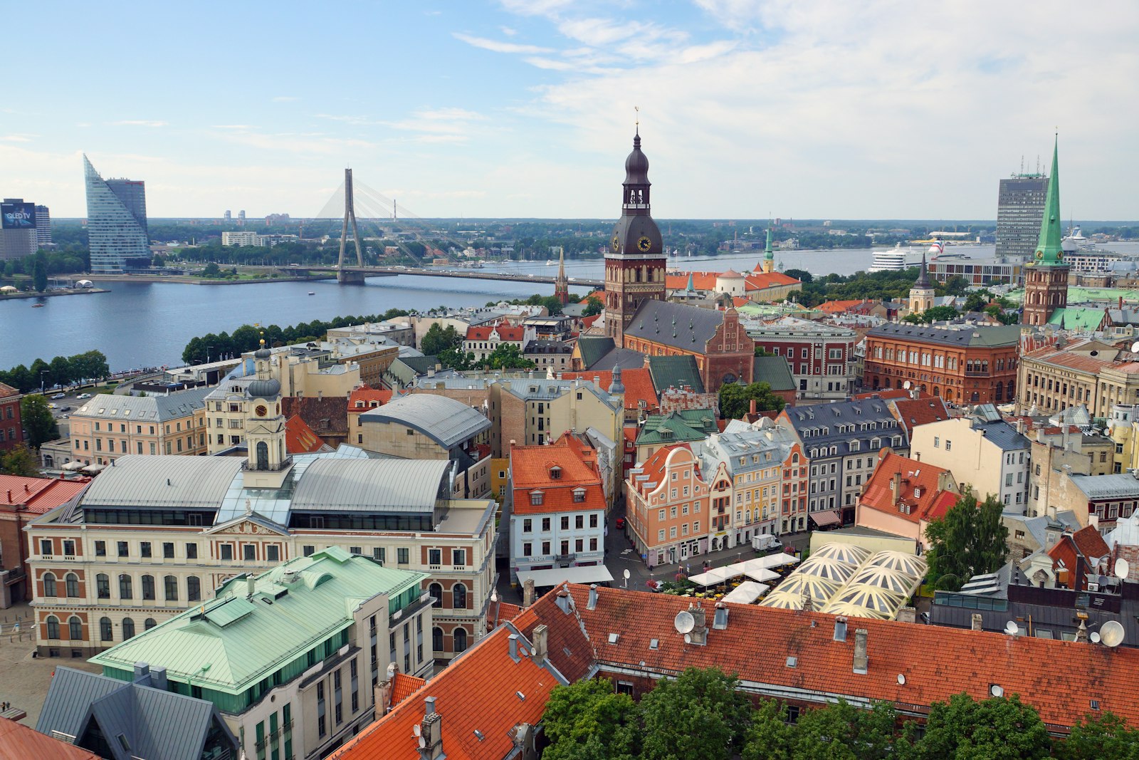 Riga Old Town with St. Peter's spire and the Daugava beyond, Latvia