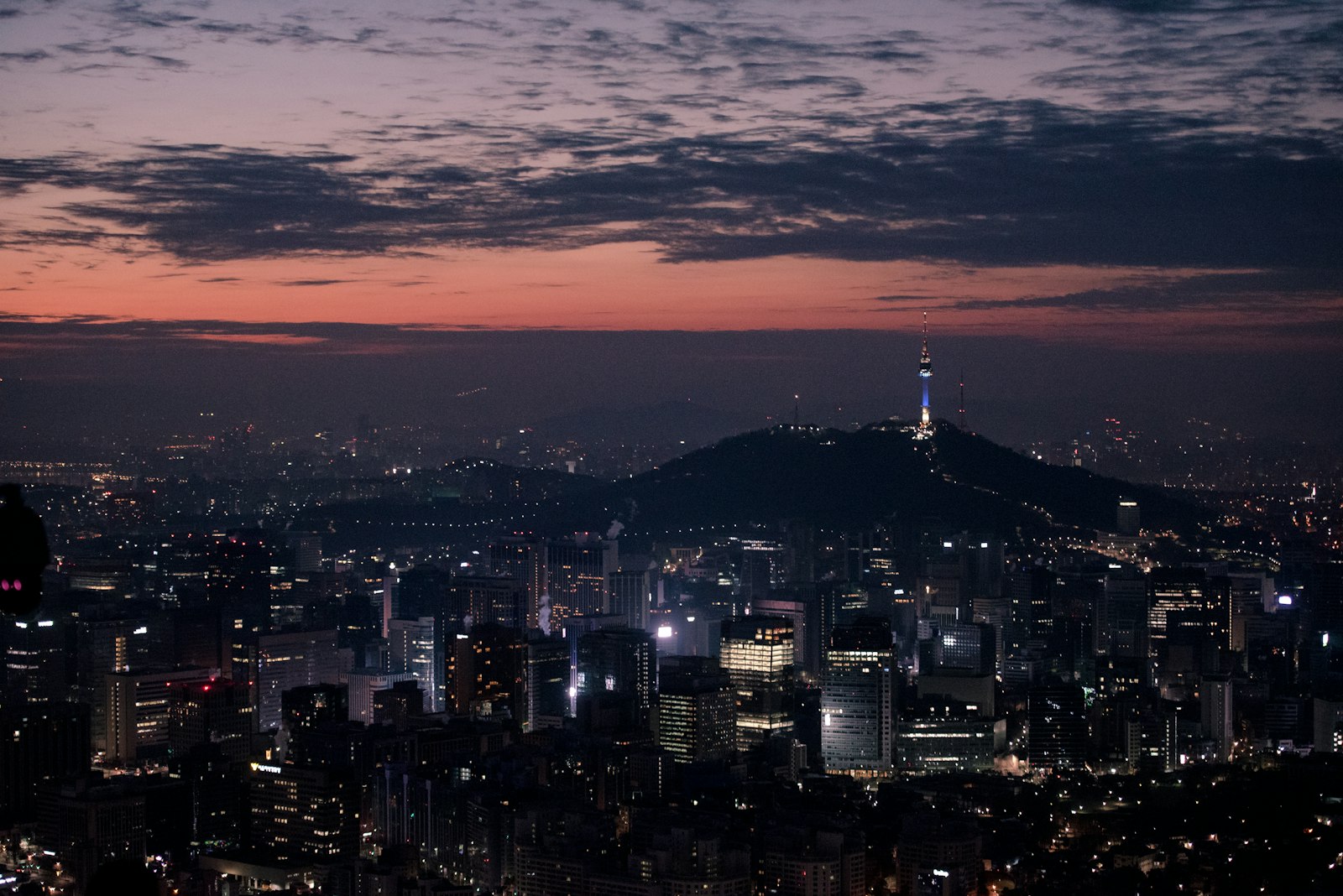 N Seoul Tower above the Seoul skyline at sunset, South Korea